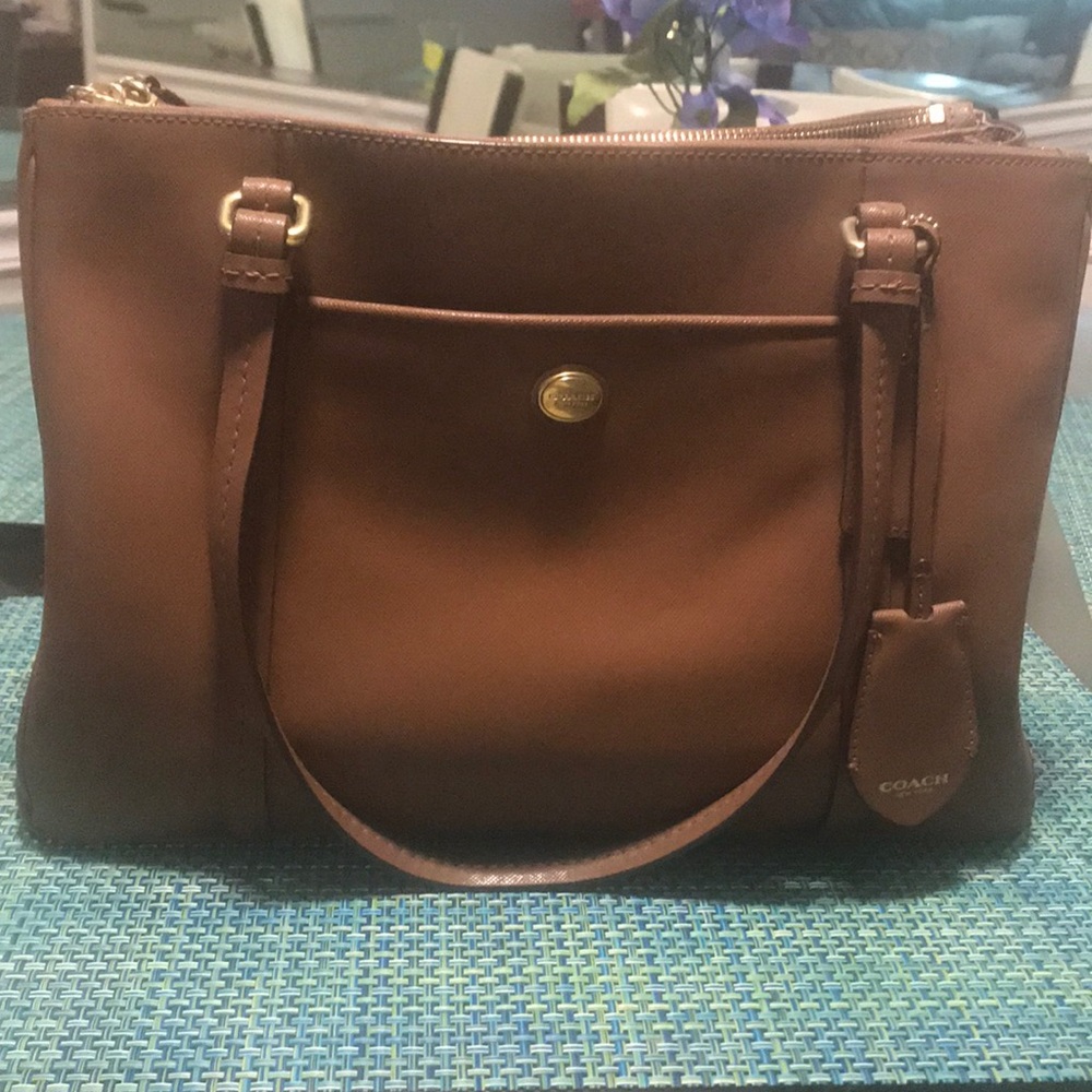 Tan Coach purse.